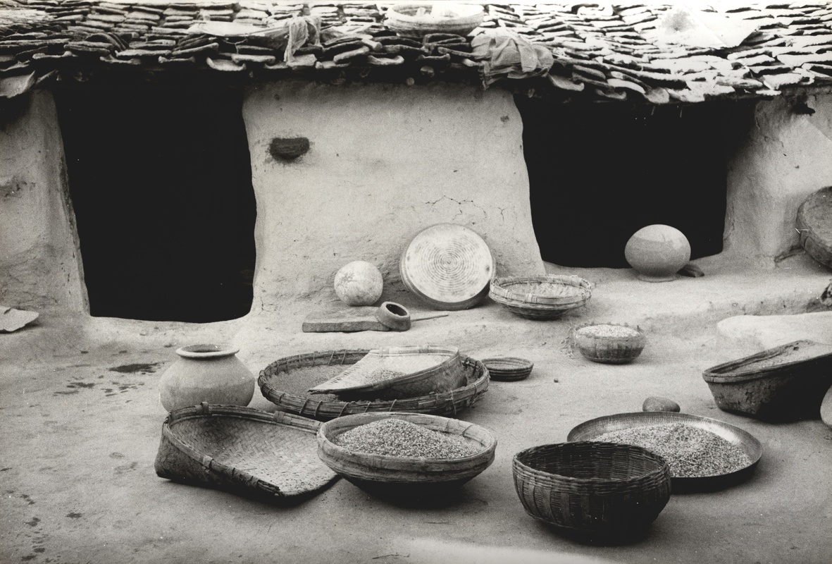 Photograph from Bollingen travels: Imphal, Manipur, India, c. 1949-50 (Baskets in front of hut)